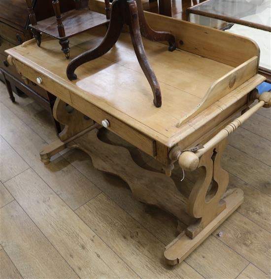 A Victorian stripped pine wash stand W.125cm